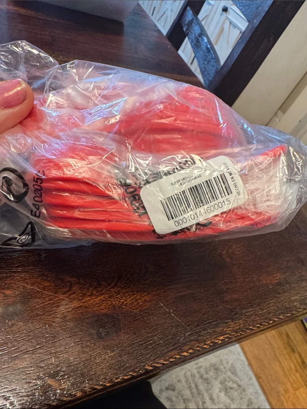 Red Tupperware measuring cups and spoons new